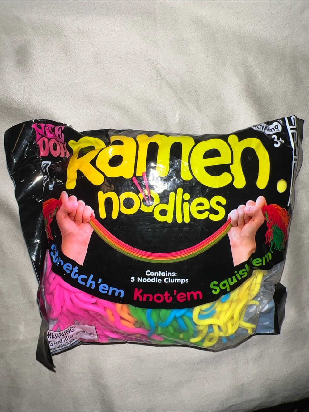 **AUTHENTIC** NeeDoh Ramen Noodles Stretchy Party Toy - Multicolor